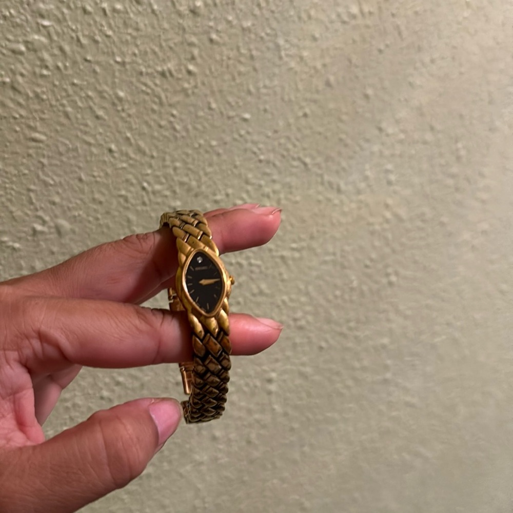 Seiko watch with diamond in middle